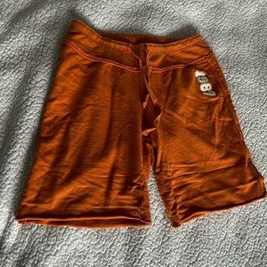 Orange long shorts for women size s run a little bigger though